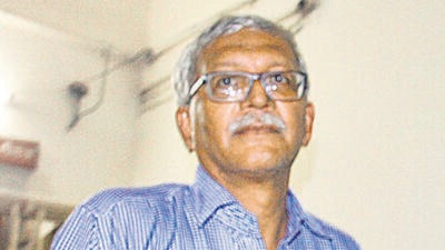 Pune: Activist Vernon Gonsalves, arrested in connection with the Bhima Koregaon violence case, being produced at a court in Pune on Wednesday, Aug 29, 2018. (PTI Photo) (PTI8_29_2018_000294B) (PTI) Pune: Activist Vernon Gonsalves, arrested in connection with the Bhima Koregaon violence case, being produced at a court in Pune on Wednesday, Aug 29, 2018. (PTI Photo) (PTI8_29_2018_000294B) (PTI)