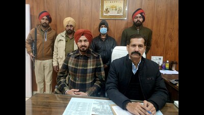 Punjab Police’s special task force yielding about the arrest of drug peddler in Ludhiana on Wednesday. (Harvinder Singh/HT) Punjab Police’s special task force yielding about the arrest of drug peddler in Ludhiana on Wednesday. (Harvinder Singh/HT)