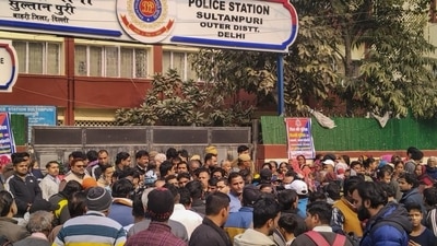 People gathered outside the Sultanpuri police station demanding strict punishment for accused in Sultanpuri accident case. (PTI) People gathered outside the Sultanpuri police station demanding strict punishment for accused in Sultanpuri accident case. (PTI)