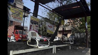 The organisation has issued a strict warning not to place such hoardings on bus stops. (HT FILE PHOTO)