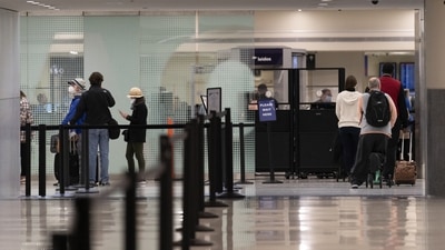 China plans to ease travel restrictions on Jan 8, despite a wave of new infections which has left Chinese hospitals and funeral houses overwhelmed. (Representative image/ AP)