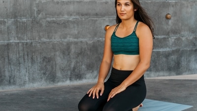 5. Vajrasana (Thunderbolt pose) - Kneel down, placing your palms on your knees, keeping your heels slightly apart, and resting your pelvis on them. Straighten your back and face forward. (Photo by Tim Chow on Unsplash) 5. Vajrasana (Thunderbolt pose) - Kneel down, placing your palms on your knees, keeping your heels slightly apart, and resting your pelvis on them. Straighten your back and face forward. (Photo by Tim Chow on Unsplash)