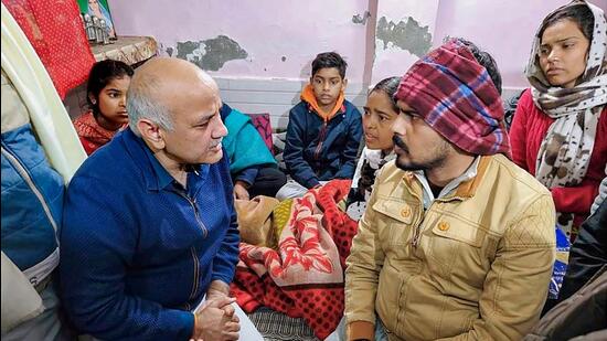 Delhi deputy chief minister Manish Sisodia meets family members of Anjali Kumari at Sultanpuri in New Delhi on Wednesday. (PTI)