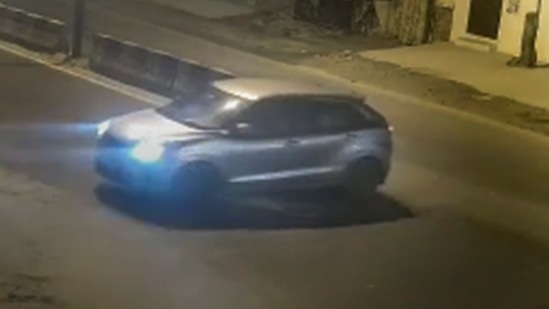 Video grab of a car that reportedly hit a woman and dragged her for kilometers, in the Sultanpuri area of Delhi. (PTI Photo)