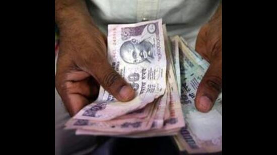 With property tax dues piling up to ₹148 crore over the past decade, the municipal corporation has issued tax default notices to around 1,000 government and commercial buildings owners in Chandigarh. (REUTERS)