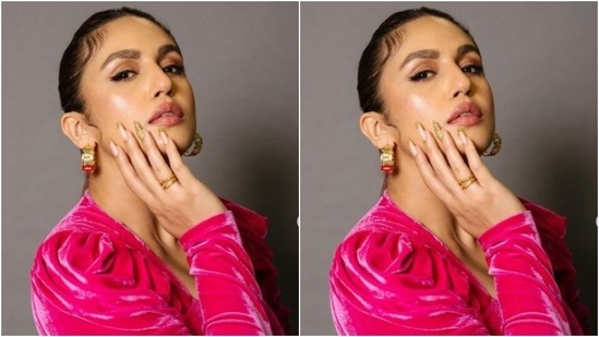 Huma's cropped top came with midriff-baring details, complemented by her black skirt with a thigh high slit, brought together with golden rings. (Instagram/@iamhumaq)