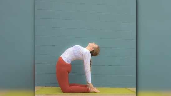 6. Ustrasana (Camel Pose) - When kneeling on the yoga mat, the hands should be placed on the hips. Arc your back, straighten your arms, and place your palms over your feet. Maintain a comfortable, neutral position for your neck. Exhale, then slowly return to the starting position.&nbsp;(Unsplash)