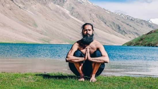 3. Malasana (Waste Evacuation Pose) - Starting from a standing position with your arms by your sides, descend your pelvis over your heels by bending your knees. Make sure your feet are firmly planted on the ground. Raise your hands in a prayer position in front of your chest or place them on the floor next to your feet.&nbsp;(Grand Master Akshar)