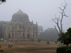 People seen at Lodhi Gardens on a cold and foggy winter morning in New Delhi, on January 5, The onset of 2023 brought in a winter chill with the Safdarjung weather station recording a minimum of 3 degrees Celsius on Thursday. (Kamal Singh / PTI) People seen at Lodhi Gardens on a cold and foggy winter morning in New Delhi, on January 5, The onset of 2023 brought in a winter chill with the Safdarjung weather station recording a minimum of 3 degrees Celsius on Thursday. (Kamal Singh / PTI)