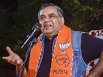 Actor and former BJP MP Paresh Rawal addresses an election campaign rally for the Gujarat Assembly elections in Surat. (PTI Photo)
