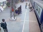 RPF personnel saving the life of a passenger who was trying to board a moving train in Bihar. 