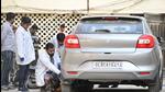 Forensic experts examining the car. (HT PHOTO) Forensic experts examining the car. (HT PHOTO)