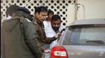 Investigators examining the car. (HT PHOTO) Investigators examining the car. (HT PHOTO)