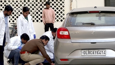 FSL team conducts an inspection of the car along with the team of police at Sultanpuri police station in the Kanjhawala death case in New Delhi on Wednesday. (ANI) FSL team conducts an inspection of the car along with the team of police at Sultanpuri police station in the Kanjhawala death case in New Delhi on Wednesday. (ANI)