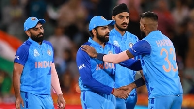 India's Rohit Sharma shakes hands with teammate Hardik Pandya, right, following (AP) India's Rohit Sharma shakes hands with teammate Hardik Pandya, right, following (AP)