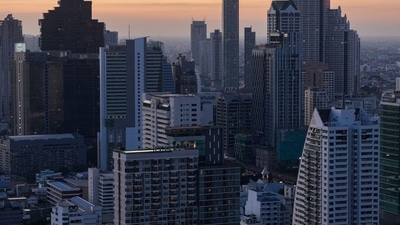 Covid In Thailand: Skyscrapers are photographed against the setting sun in Bangkok, Thailand. (Reuters)
