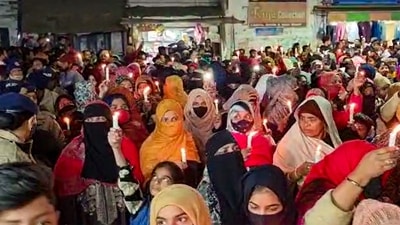 Haldwani: Residents take out a candle march against the Uttarakhand High Court's order for removal of encroachments from the railway land, in Haldwani, Tuesday. (PTI) Haldwani: Residents take out a candle march against the Uttarakhand High Court's order for removal of encroachments from the railway land, in Haldwani, Tuesday. (PTI)