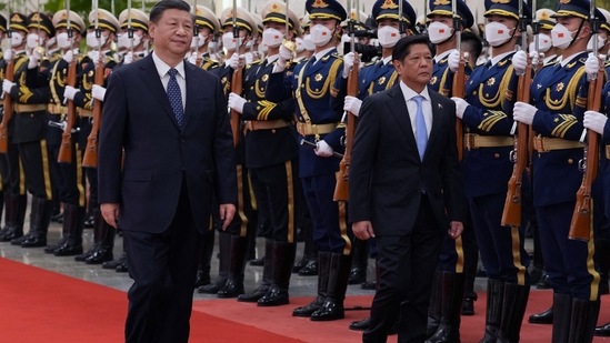Chinese President Xi Jinping and Philippine President Ferdinand Marcos Jr are seen.(Reuters)