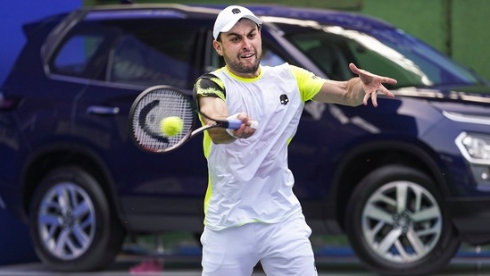 Aslan Karatsev plays during his men's singles quarterfinals match against Pedro Martinez(PTI)