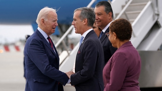 Eric Garcetti: US President Joe Biden is greeted by Eric Garcetti.(Reuters)