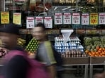 Food prices are displayed at a market in Rio de Janeiro, Brazil.