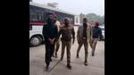 Gangster Dhru Daudhar (face covered) being produced in a court in Ludhiana on Thursday. Gangster Dhru Daudhar (face covered) being produced in a court in Ludhiana on Thursday.