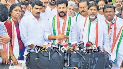 A Congress delegation, led by Telangana chief A Revanth Reddy, lodged a complaint with police, seeking action against the BRS leadership, including chief minister K Chandrashekar Rao, for allegedly poaching the elected representatives of the party. (HT Photo) A Congress delegation, led by Telangana chief A Revanth Reddy, lodged a complaint with police, seeking action against the BRS leadership, including chief minister K Chandrashekar Rao, for allegedly poaching the elected representatives of the party. (HT Photo)