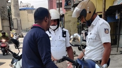 In Bengaluru, over 100 fined for altering number plates. Cops thank heavy rains In Bengaluru, over 100 fined for altering number plates. Cops thank heavy rains