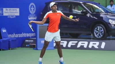 India's Manas Dhamne in action during a singles opening round match against Michael Mmoh at the 5th Tata Open Maharashtra, in Pune. (PTI) India's Manas Dhamne in action during a singles opening round match against Michael Mmoh at the 5th Tata Open Maharashtra, in Pune. (PTI)
