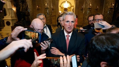 US House Republican Leader Kevin McCarthy (R-CA) talks to reporters as he leaves the House Chamber during the third day of elections for Speaker of the House at the US Capitol Building on Thursday in Washington, DC. (Getty Images via AFP) US House Republican Leader Kevin McCarthy (R-CA) talks to reporters as he leaves the House Chamber during the third day of elections for Speaker of the House at the US Capitol Building on Thursday in Washington, DC. (Getty Images via AFP)