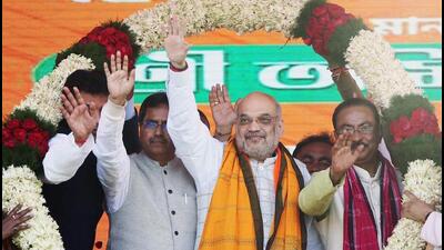 Union home minister Amit Shah being garlanded during a public rally, at Sabroom, in South Tripura on Thursday. (ANI) Union home minister Amit Shah being garlanded during a public rally, at Sabroom, in South Tripura on Thursday. (ANI)