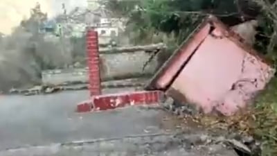 Screengrab of the video showing temple collapsing in Joshimath. (ANI)