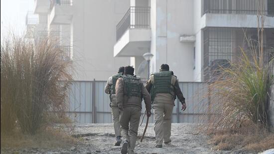 Noida forest officials at Ajnara Le Garden society are increasing vigilance on the upper floors of the under-construction towers. (Sunil Ghosh/HT Photo)