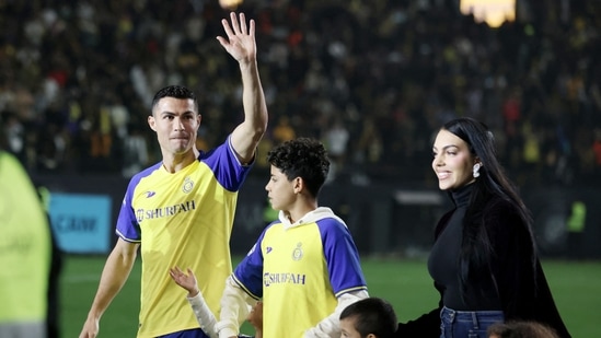 New Al Nassr signing Cristiano Ronaldo with his partner Georgina Rodriguez and kids during his presentation.(REUTERS)