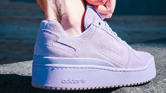 Adidas shoes look smart and enhance the appeal of the person wearing them. (Pexels)