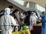 Portugal: Arriving travelers queue for Covid-19 tests at Changshui International Airport.(Bloomberg) Portugal: Arriving travelers queue for Covid-19 tests at Changshui International Airport.(Bloomberg)