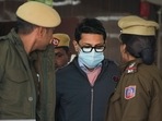 Shankar Mishra, accused of urinating on a woman passenger on an Air India flight from New York to Delhi, being taken away by the police from the DCP office at IGI Airport in New Delhi on Saturday, 
