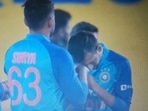 Yuzvendra Chahal kisses Suryakumar Yadav's hands. Yuzvendra Chahal kisses Suryakumar Yadav's hands.