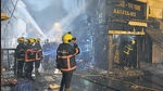 Since the smoke was trapped inside the structure that caught fire, A bulldozer was brought in at around 10 pm to break the roof after fire fighters failed to break in manually. Heavy deployment of police was done by Mumbai Police in the lanes to control the crowd and traffic in the market. (Anshuman Poyrekar/HT PHOTO) Since the smoke was trapped inside the structure that caught fire, A bulldozer was brought in at around 10 pm to break the roof after fire fighters failed to break in manually. Heavy deployment of police was done by Mumbai Police in the lanes to control the crowd and traffic in the market. (Anshuman Poyrekar/HT PHOTO)