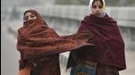 Women seen wrapped in shwals and woollens as Delhi witnesses intense cold conditions (HT Photo) Women seen wrapped in shwals and woollens as Delhi witnesses intense cold conditions (HT Photo)