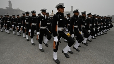 An Indian Navy contingent is seen rehearsing for the Republic Day parade on Kartavya Path on a foggy morning, on January 6. Delhi recorded a cold wave for a second day on the trot on Friday, with the minimum temperature at Ayanagar in southwest Delhi plunging to a numbing 1.8 degrees Celsius, PTI reported. (Raj K Raj / HT Photo) An Indian Navy contingent is seen rehearsing for the Republic Day parade on Kartavya Path on a foggy morning, on January 6. Delhi recorded a cold wave for a second day on the trot on Friday, with the minimum temperature at Ayanagar in southwest Delhi plunging to a numbing 1.8 degrees Celsius, PTI reported. (Raj K Raj / HT Photo)