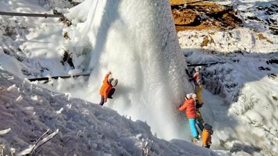 Children enjoy on a snow-clad hill in the Tangmarg area of north Kashmir’s Baramulla district on Saturday. The cold wave continued taking the night temperature to minus 6.4 degrees Celsius below freezing in Kashmir Valley. (ANI)