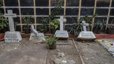 Father Lancy Pinto, the parish priest of Mahim Church, said, “Some staff members came to me and said there had been an incident at the graveyard. Initially I thought it must be something minor, but when I went there, I was shocked to see so many graves vandalised. After damaging the crosses on the graves, the man then went inside the church to offer his prayers before leaving.” (Satish Bate/HT PHOTO) Father Lancy Pinto, the parish priest of Mahim Church, said, “Some staff members came to me and said there had been an incident at the graveyard. Initially I thought it must be something minor, but when I went there, I was shocked to see so many graves vandalised. After damaging the crosses on the graves, the man then went inside the church to offer his prayers before leaving.” (Satish Bate/HT PHOTO)