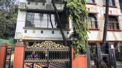 Residence of Shankar Mishra, who is booked by Delhi Police for allegedly urinating on a senior citizen woman, a co-passenger onboard an Air India flight, in Mumbai Central, (PTI) Residence of Shankar Mishra, who is booked by Delhi Police for allegedly urinating on a senior citizen woman, a co-passenger onboard an Air India flight, in Mumbai Central, (PTI)