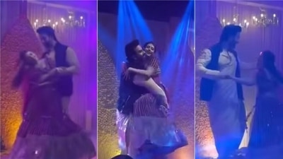Charu Asopa and Rajeev Sen dance together.