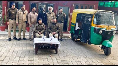 The accused, Vijay Kumar, alias Bittu, 19, in the custody of Chandigarh Police. Police also recovered four stolen mobile phones and the auto-rickshaw used in the crimes. (HT Photo) The accused, Vijay Kumar, alias Bittu, 19, in the custody of Chandigarh Police. Police also recovered four stolen mobile phones and the auto-rickshaw used in the crimes. (HT Photo)