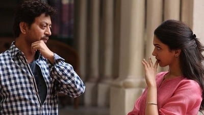 Irrfan Khan and Deepika Padukone on sets of Piku. Irrfan Khan and Deepika Padukone on sets of Piku.