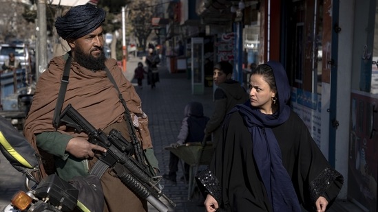 Afghanistan: A Taliban fighter stands guard in Kabul, Afghanistan. (AP)