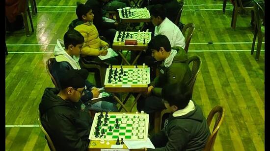 Players competing during the chess tournament at BCM Arya School in Ludhiana. (HT FILE PHOTO)