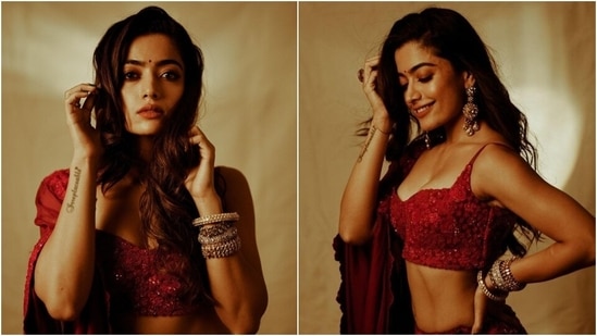 Rashmika Mandanna looks dreamy in beautiful red lehenga and deep-neck blouse set. 
